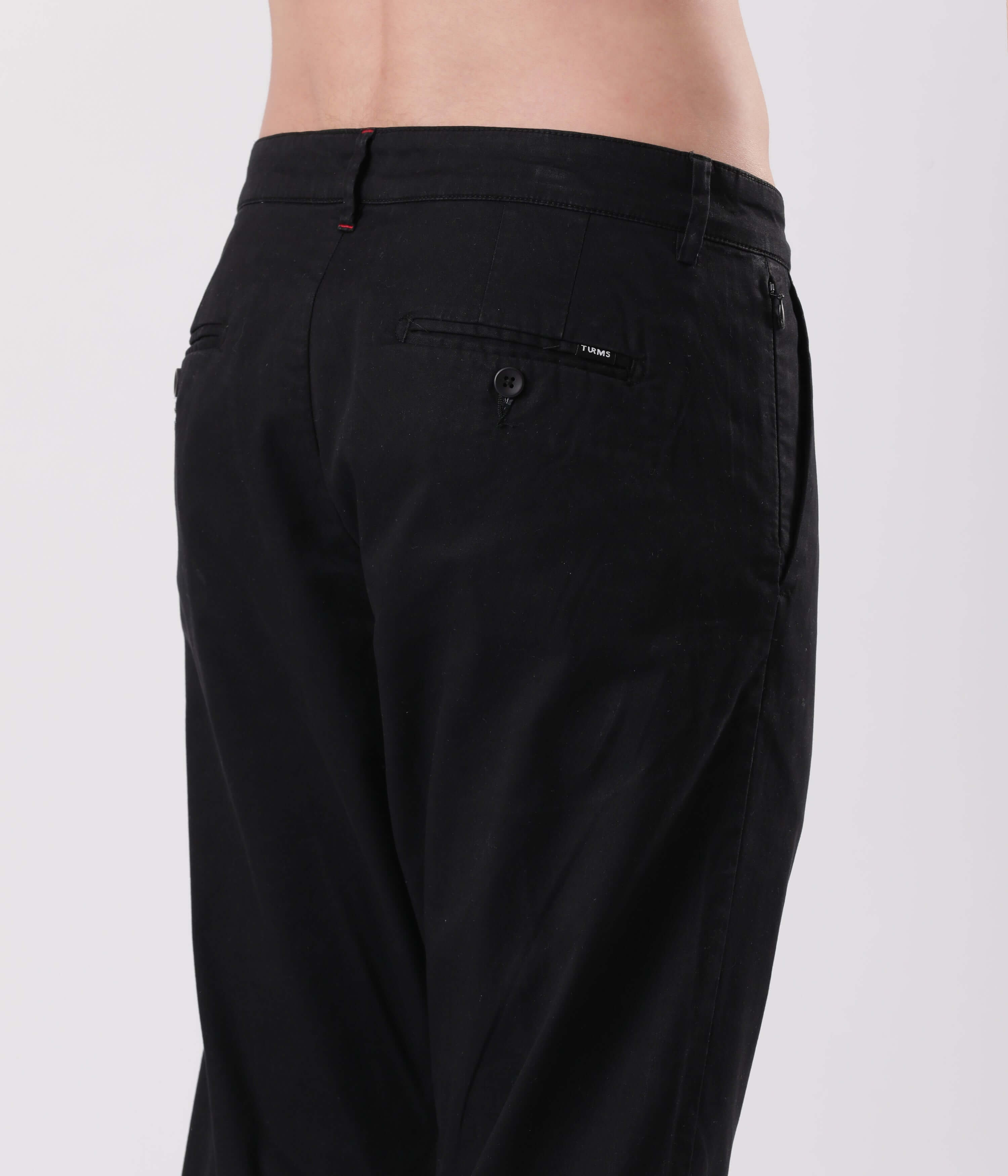 Back view of Turms Black Sea Chino showcasing stylish pockets and quality stitching.