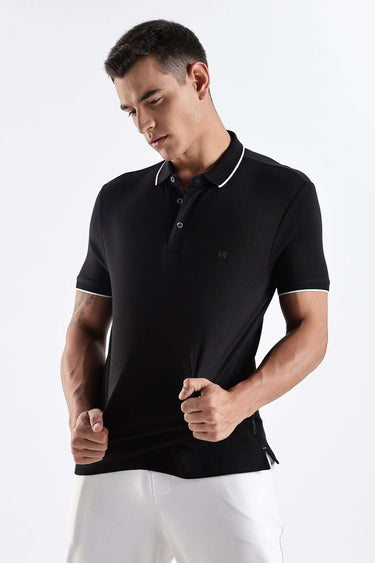 Black Primal Black polo tshirt made of premium cotton, featuring anti-odour, waterproof, and antistain technology.