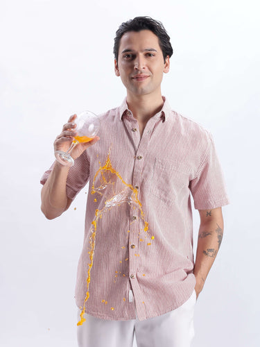 Bordeaux Maroon linen shirt from turms intelligent apparel, showcasing anti stain and waterproof features in action.