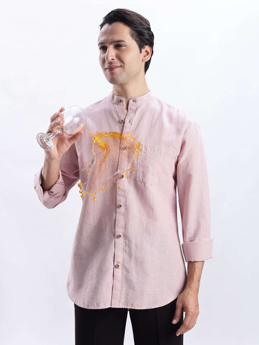Model wearing Wood Rose 2.0 linen shirt showcasing its waterproof, anti-odour, anti-stain features.