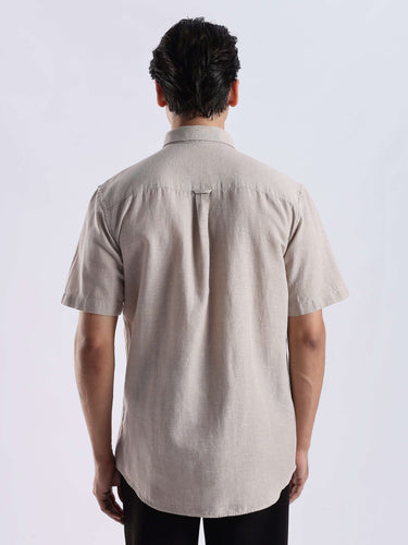 Desert Rider linen shirt from Turms Intelligent Apparel showcasing a soft beige color and stylish design.