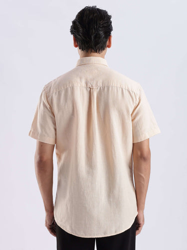 Opalescent Sand linen shirt from Turms Intelligent Apparel, showcasing a sleek back design, perfect for everyday luxury.