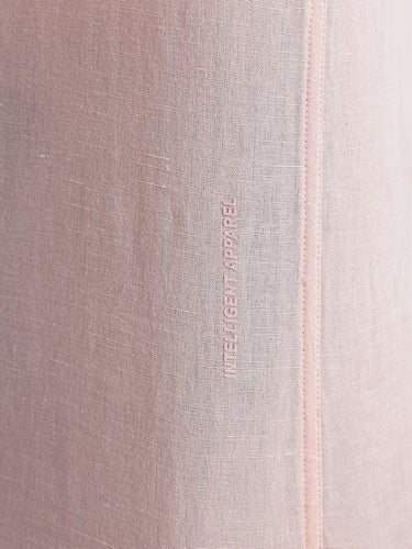 Peach Fuzz premium linen shirt from turms intelligent apparel with durable weave and elegant design.