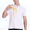Man wearing Lavender Fires premium cotton polo, pouring juice, showcasing anti-stain and water-proof features.