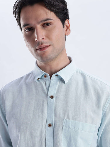 Moon Mist premium linen shirt from turms intelligent apparel featuring soft blue color and durable design perfect for everyday luxury.