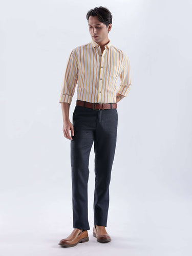 Model wearing Lemon Meringue premium linen shirt from Turms Intelligent Apparel with stylish trousers.
