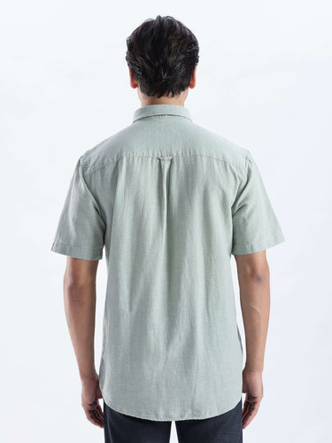 Fern Green linen shirt from turms intelligent apparel showcasing the back design, highlighting breathable and durable fabric.