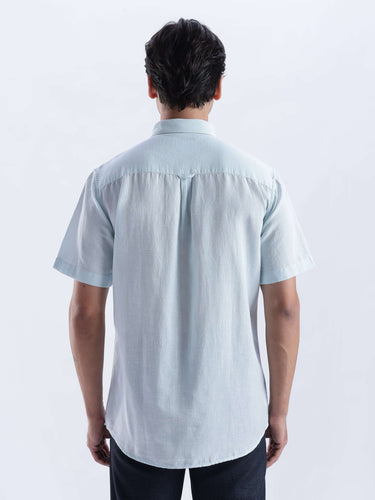 Back view of the Blue Surf linen shirt from Turms Intelligent Apparel, showcasing its breathable and stylish design.