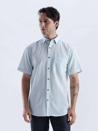Blue Surf linen shirt from Turms Intelligent Apparel, stylish and breathable, featuring anti-stain and waterproof qualities.