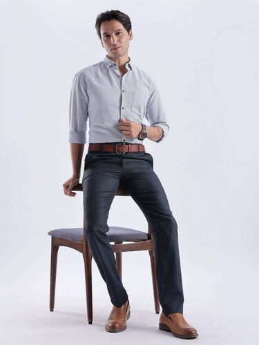 Man wearing Skyline Blue premium linen shirt from Turms Intelligent Apparel, showcasing style and functionality.