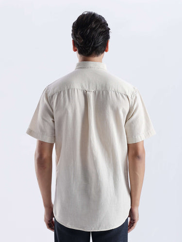 Back view of Sandy Glow linen shirt, showcasing premium quality, water proof, anti odour, and anti stain features.