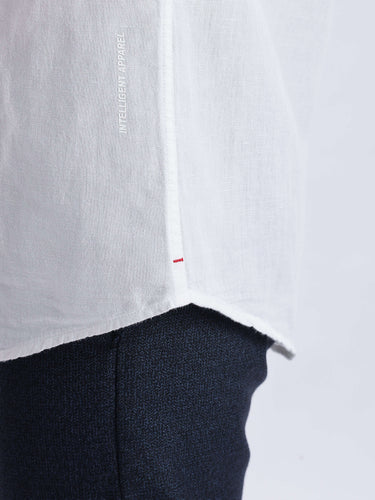 Close-up of Snow Fox premium linen shirt showcasing its durable fabric and intelligent apparel features.