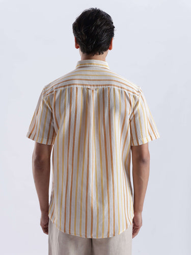 Back view of a man wearing the Golden Charm linen shirt from Turms Intelligent Apparel with a striped design.