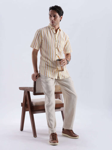 Golden Charm linen shirt from turms intelligent apparel worn by a model, showcasing style and luxury.