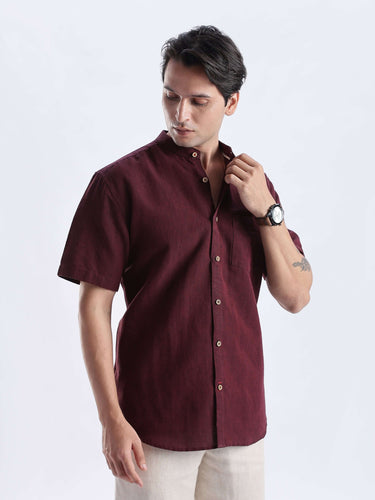 Castlevania: Model wearing a burgundy linen shirt from Turms Intelligent Apparel, offering style and durability.