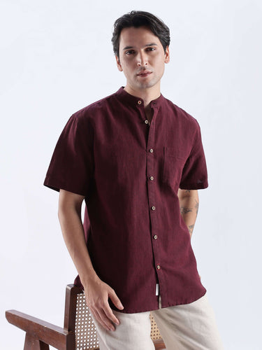 Castlevania featuring a stylish maroon linen shirt from Turms Intelligent Apparel, breathable and anti-odour for everyday luxury.