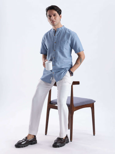 Ocean Mist: Model wearing a Turms Intelligent Linen shirt, showcasing style with breathable fabric and a crisp finish.