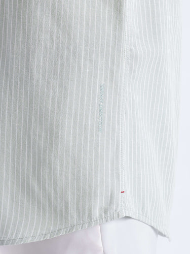 Limey Cream linen shirt showcasing premium quality, anti-odour, waterproof, and anti-stain features in stylish design.