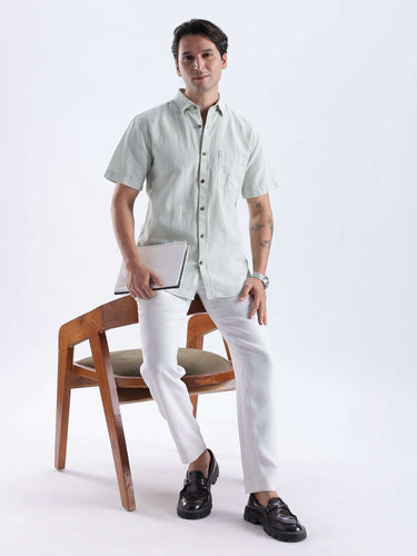 Limey Cream linen shirt, premium quality, water proof, anti odour, anti stain, styled with white pants.