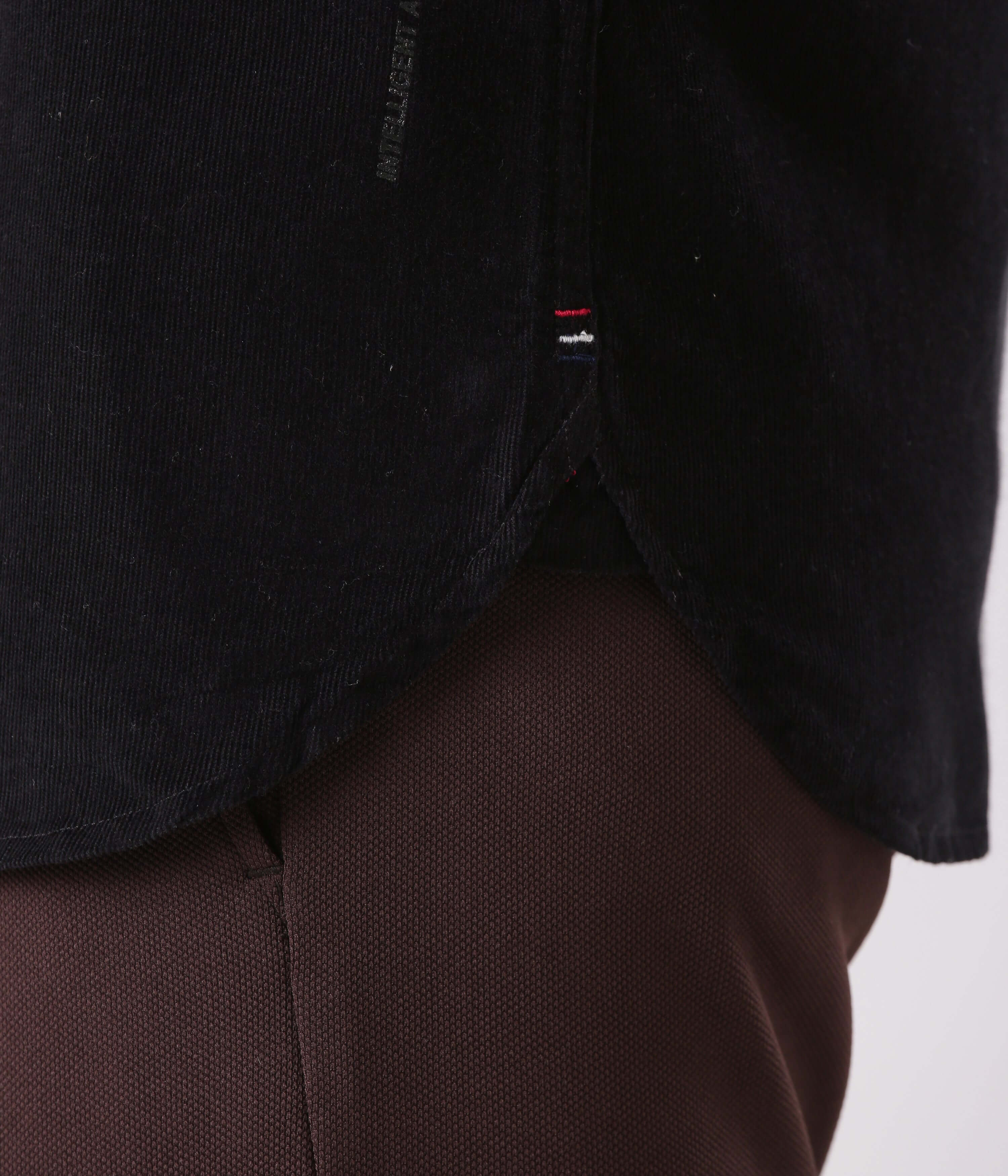 Close-up of Black Beauty corduroy shirt with sleek design, showcasing premium stitching and modern style.