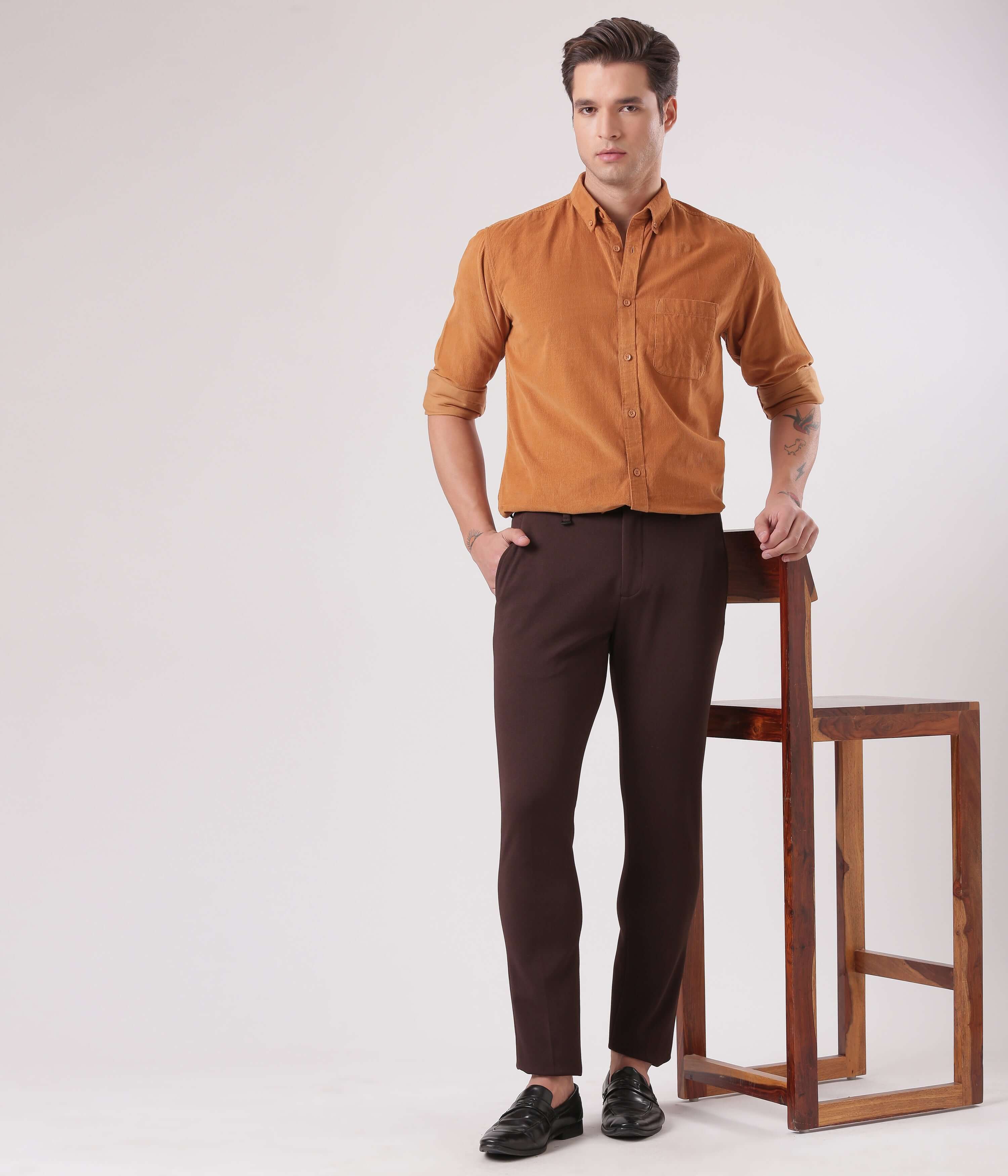 Brown Toffee corduroy shirt with water proof turms intelligent apparel worn by man in stylish outfit