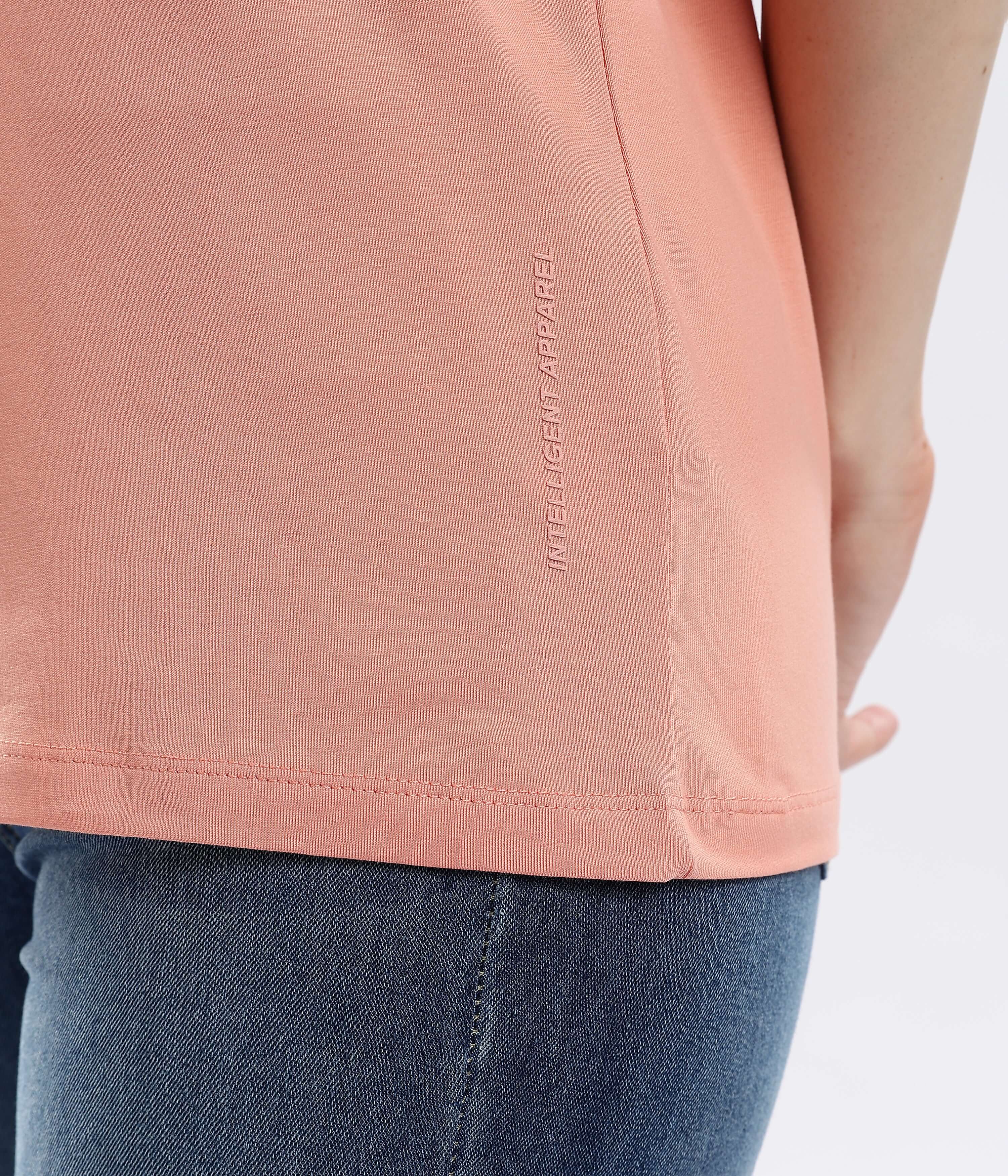 Detail of Womens casual t-shirt Ember Orange cotton tshirt showing intelligent apparel stitching and design.