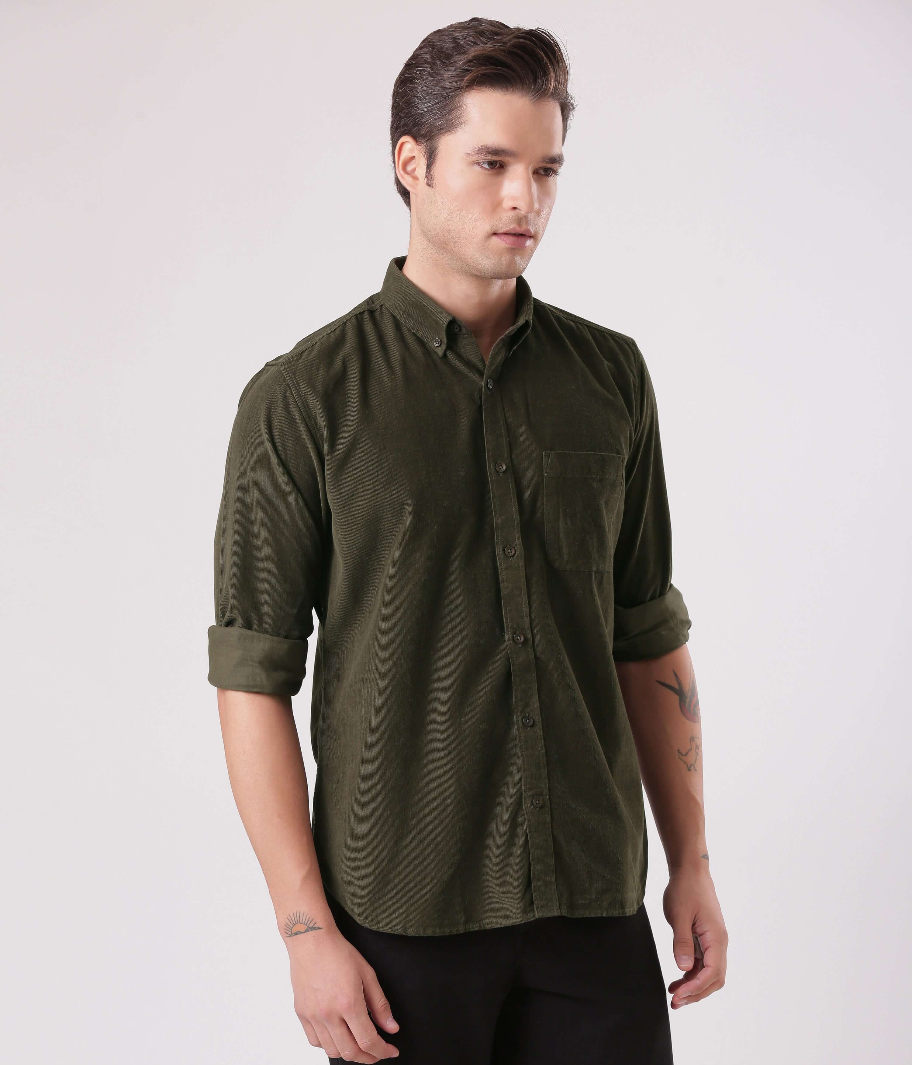 Emerald Star corduroy shirt showcasing a man in an olive green shirt, featuring stylish and functional design.