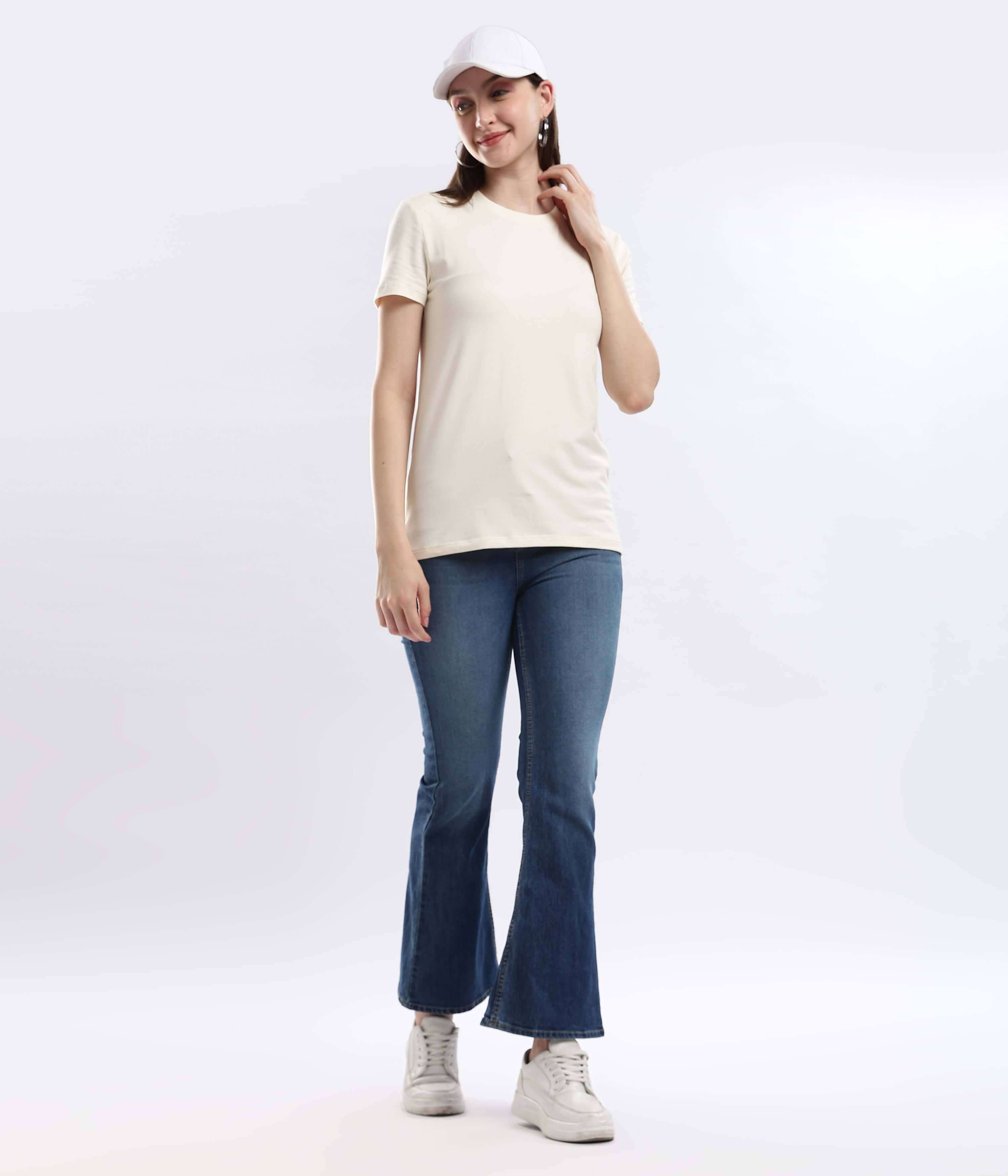 Model wearing Polar Off-white cotton tshirt with stretchable, waterproof, and anti-odour features.