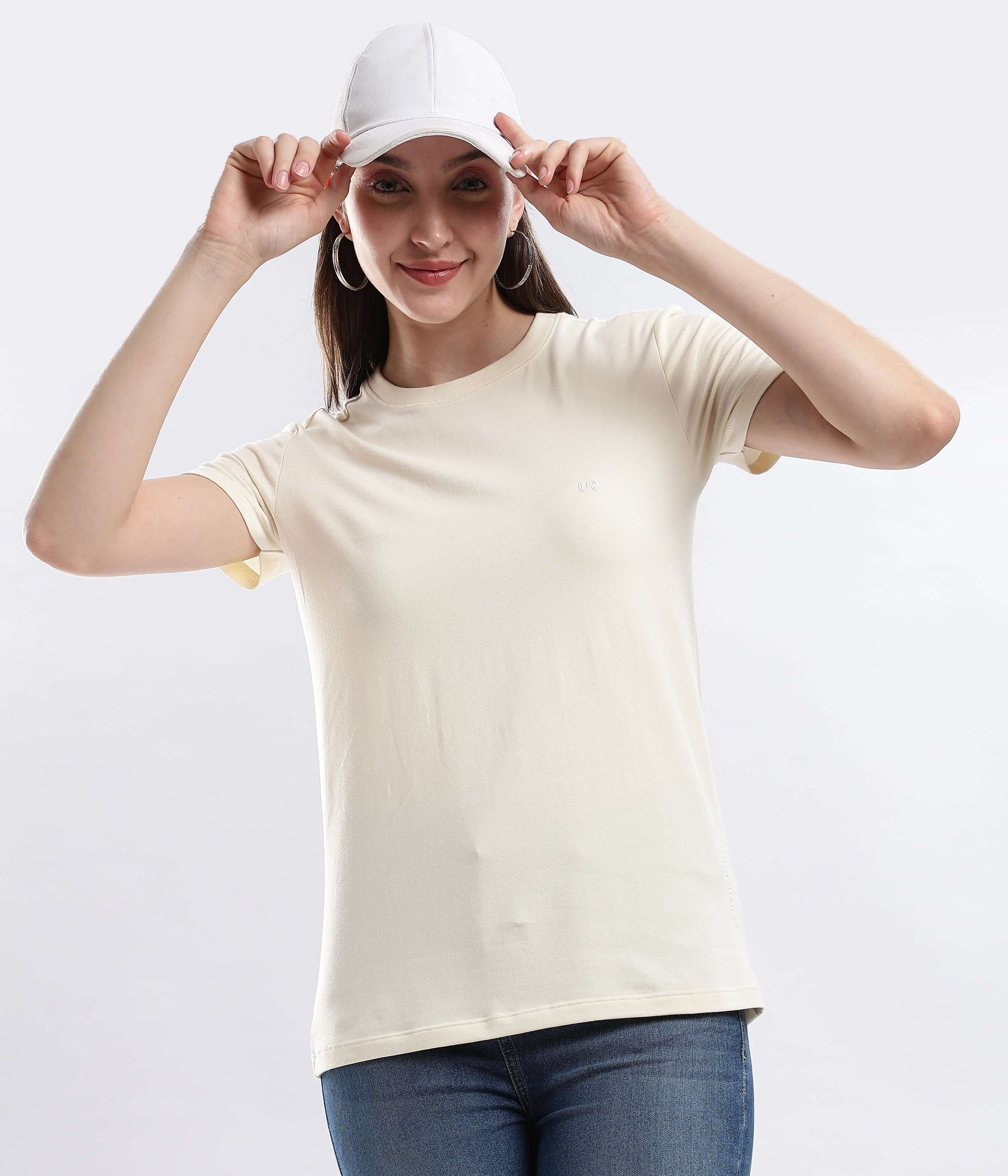 Polar Off-white cotton t-shirt model wearing cap, showcasing style and comfort in everyday wear.