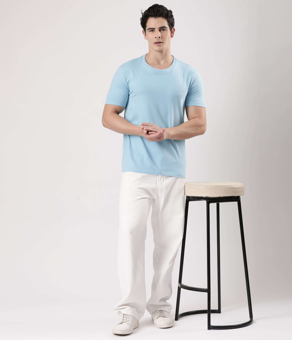 Alaskan Blue Turms intelligent apparel men's T-shirt, showcasing style and comfort in a casual setting.