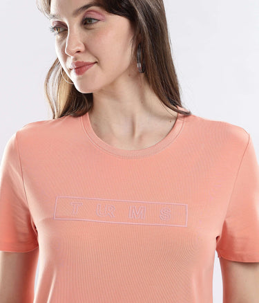 Womens casual t-shirt Ember Orange cotton t-shirt featuring the Turms logo, stretchable, waterproof, and anti-odour for everyday comfort.