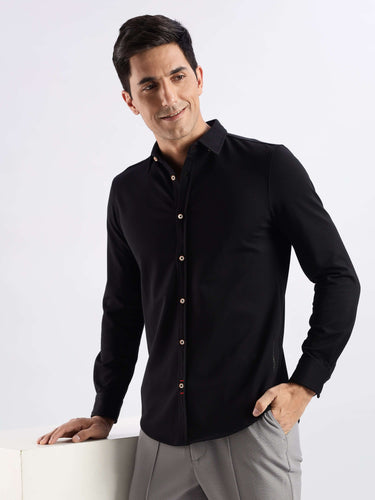 Venice Black knitted shirt featuring 8-way stretch, anti-odour, anti-stain quality from Turms for ultimate comfort.