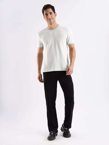 Man wearing a premium Nova Grey Turms Intelligent Ice Cool Tech T-Shirt, showcasing style and comfort.