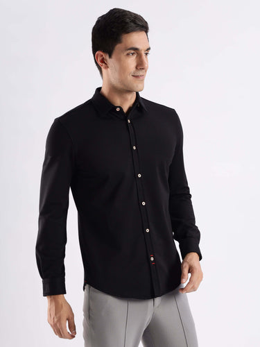 Venice Black Turms knitted shirt, featuring 8-way stretch, anti-odour and stain technology, perfect for stylish comfort.