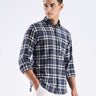 Model wearing the Turms Intelligent Recycled Cotton Checked Shirt in navy and white, showcasing sustainable style.