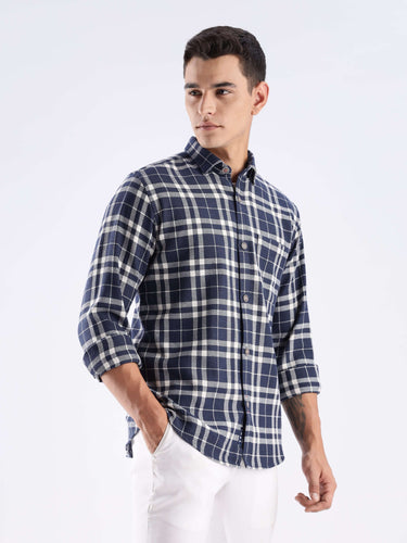Model wearing the Turms Intelligent Recycled Cotton Checked Shirt in navy and white, showcasing sustainable style.