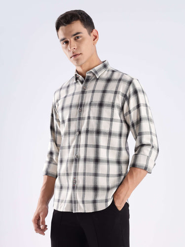 Model wearing the Turms recycled cotton checked shirt, showcasing sustainable fashion with a stylish design.