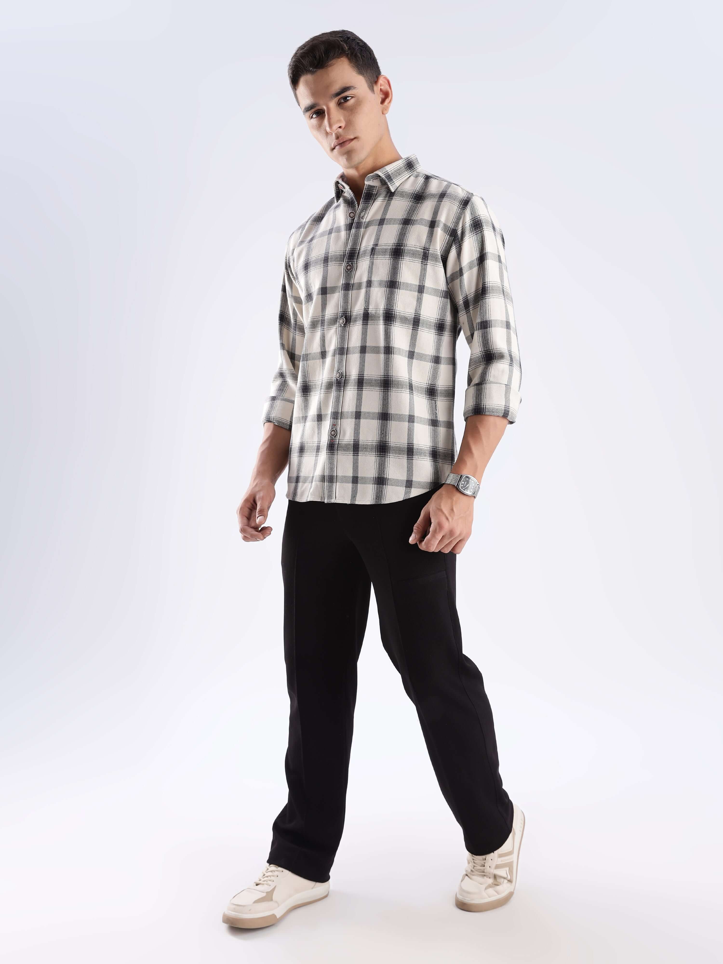 Model wearing the Turms recycled cotton checked shirt, showcasing sustainable fashion with a stylish design.