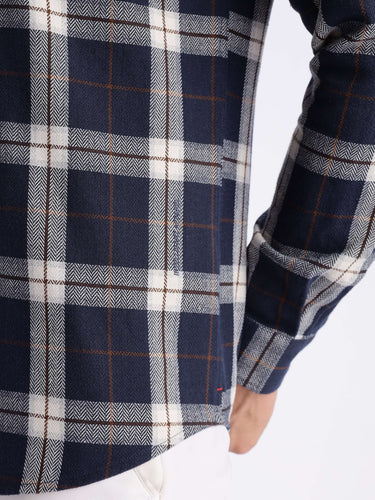 Close-up of the Blue Arkham recycled cotton checked shirt showcasing its stylish navy plaid pattern and premium stitching.