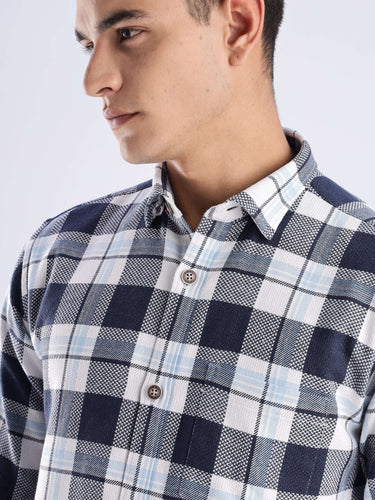 Turms sustainable recycled cotton shirt in blue check pattern, showcasing cool tech features and anti-odor properties.