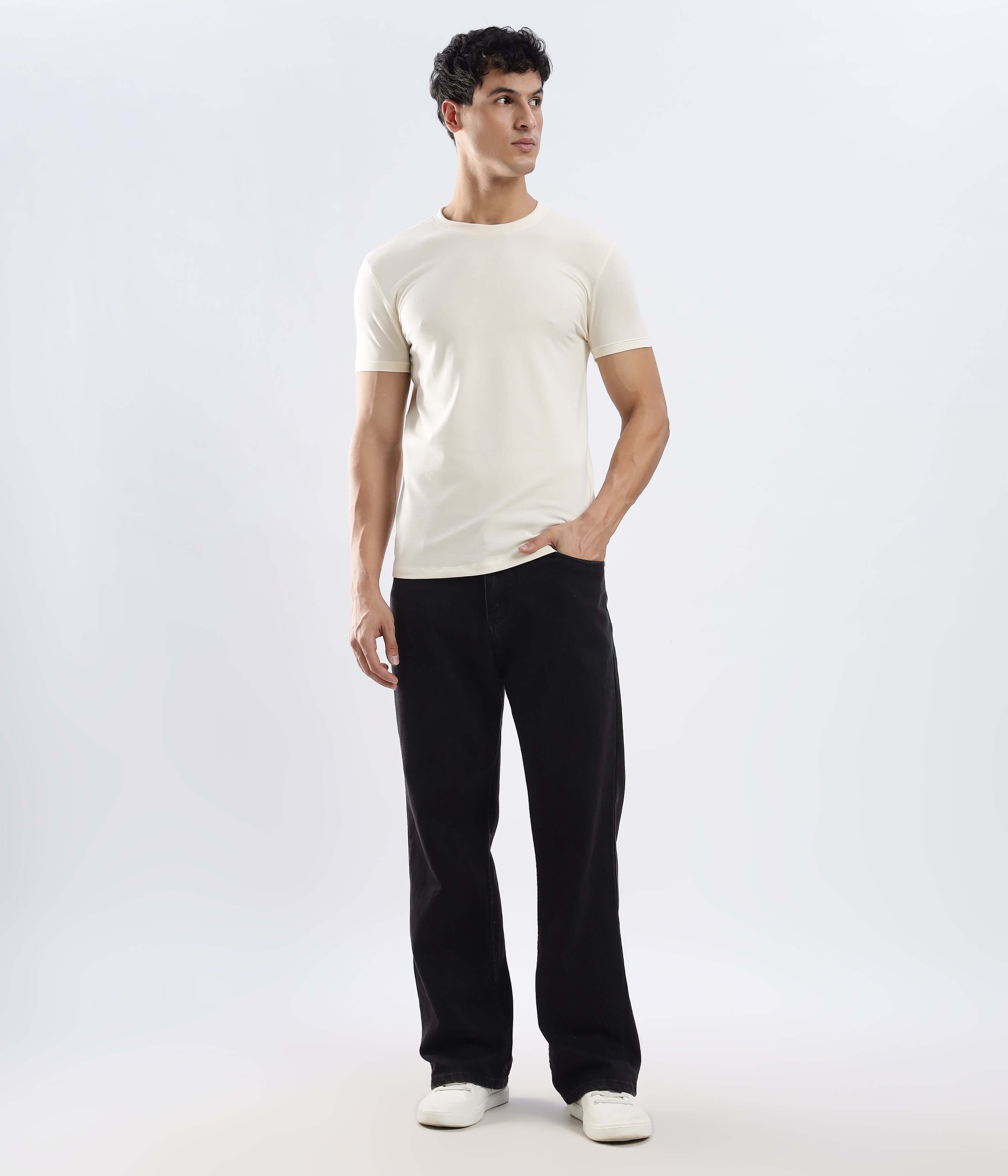 Model wearing a Polar Off-white stretchable cotton t-shirt, showcasing style and comfort.