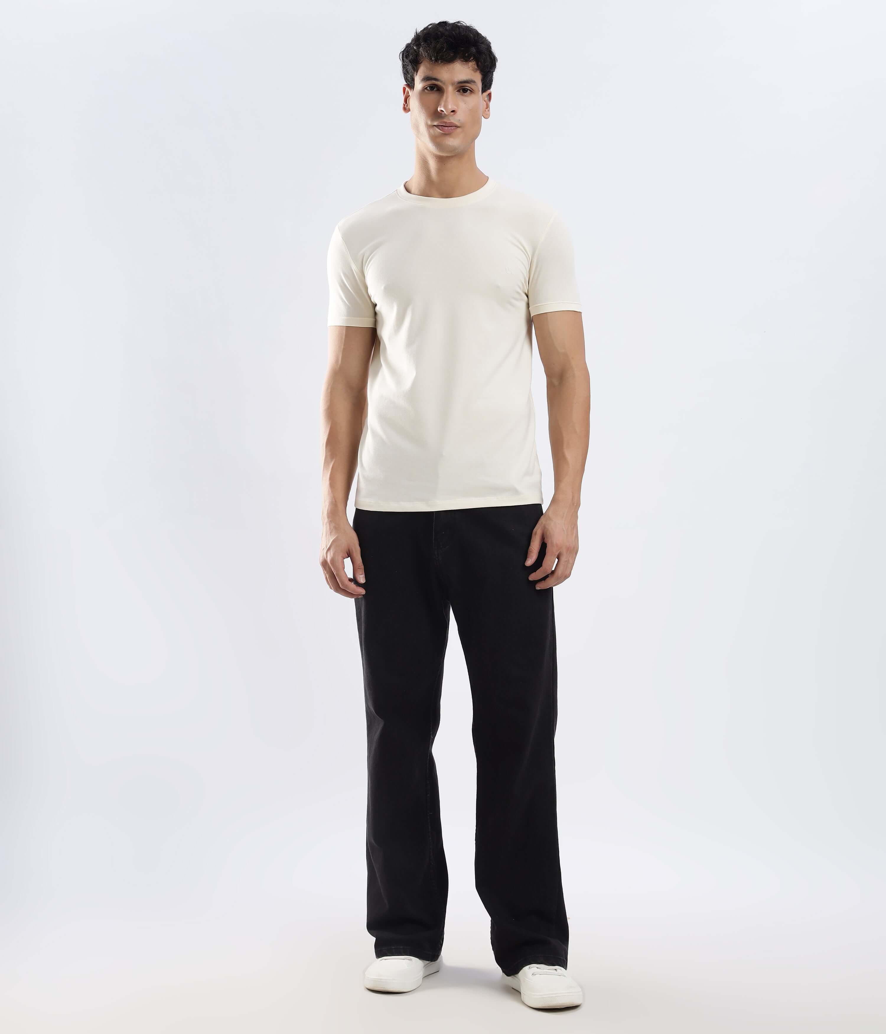 Model wearing Polar Off-white cotton t-shirt, showcasing stretchable, waterproof, and anti-odour features for everyday style.