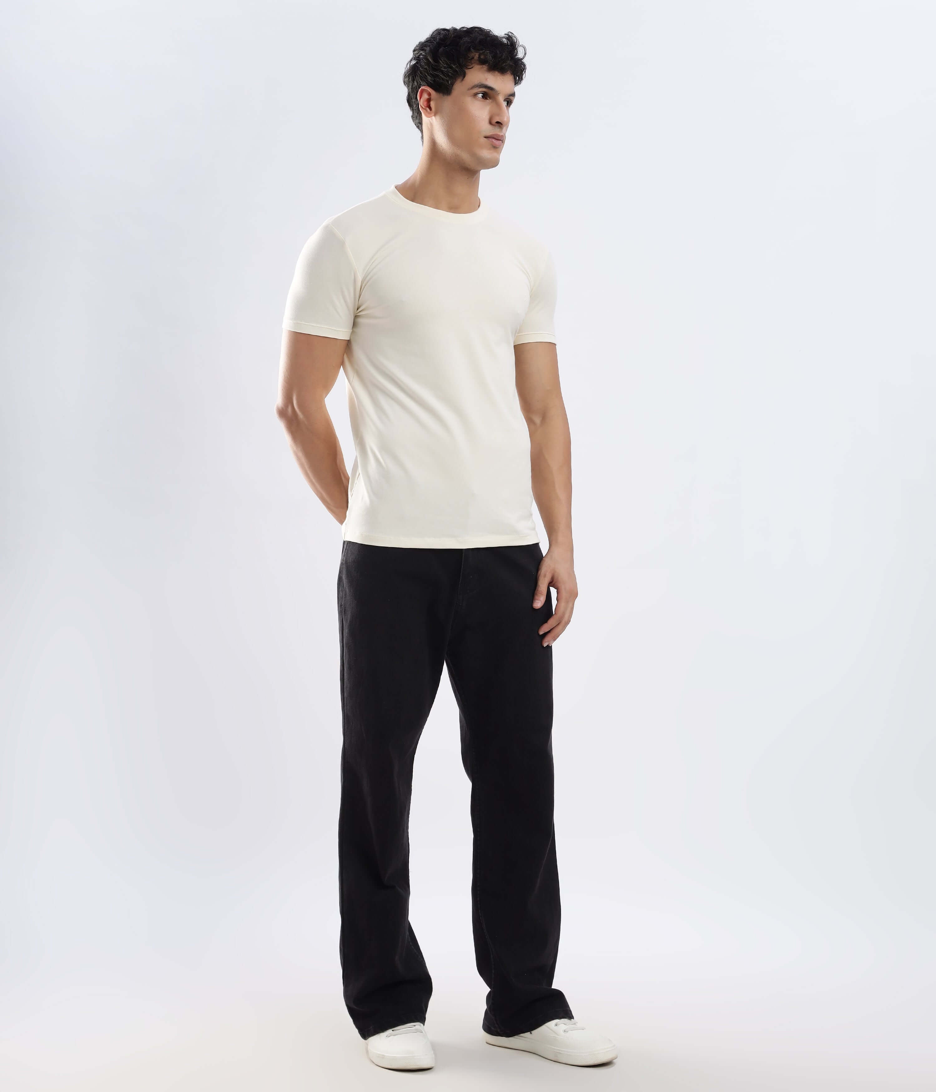 Man wearing Polar Off-white cotton t-shirt, showcasing stretchable, water-proof, anti-odour features for ultimate comfort.