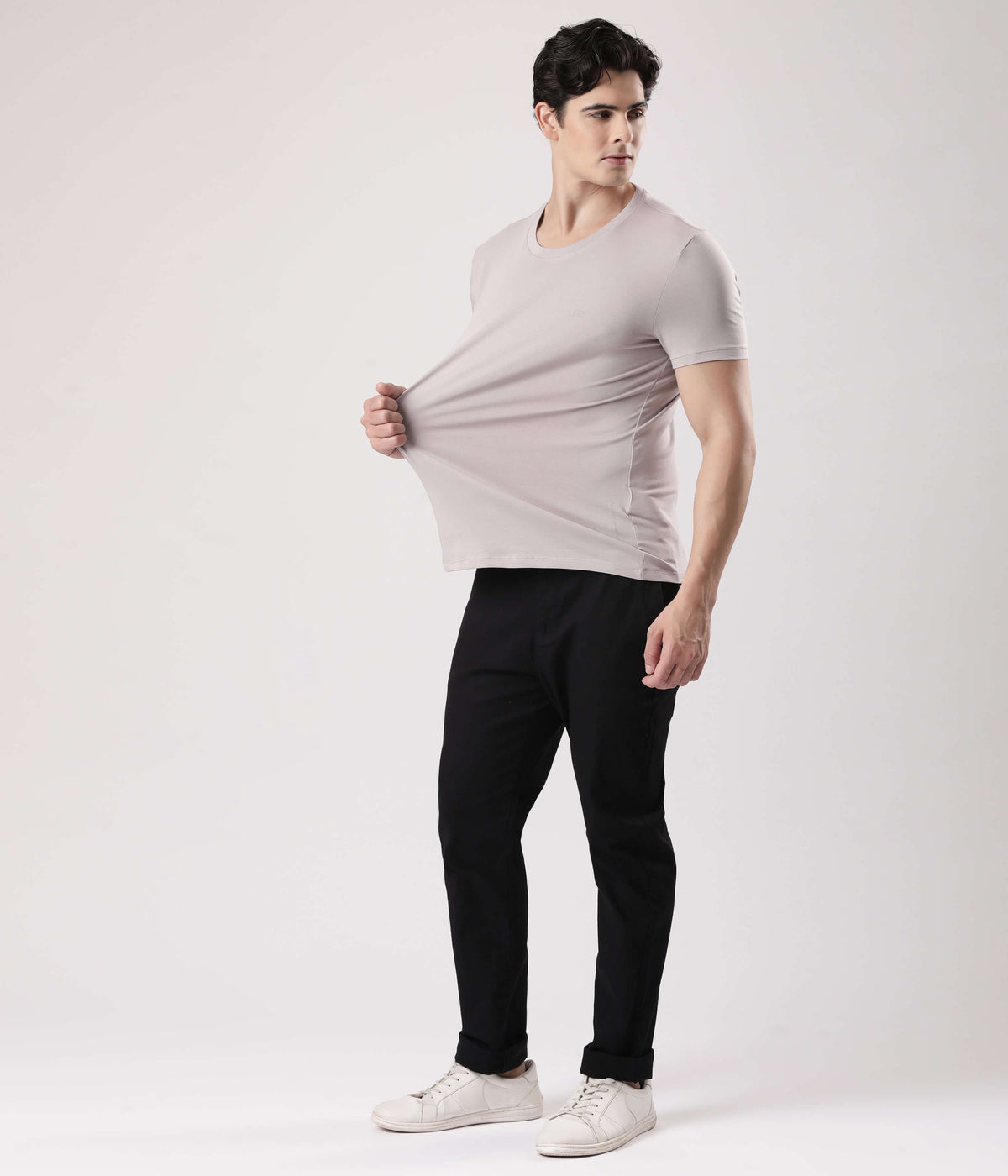 Model wearing Panther Grey Turms Intelligent T-Shirt, highlighting comfort and style, ideal for men's casual wear.