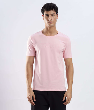Man wearing Quartz Pink Turms Worry-Free Intelligent T-Shirt, a stretchable cotton t-shirt that is waterproof and anti-odour.
