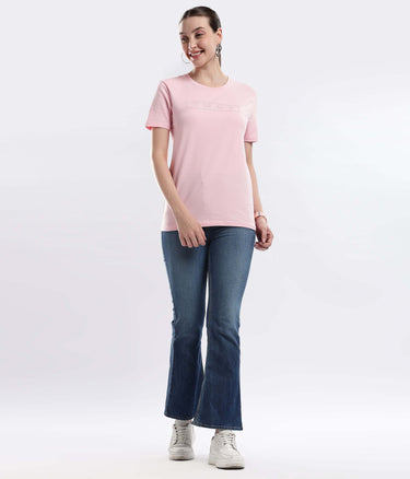 Model wearing Womens casual t-shirt Quartz Pink cotton tshirt with stretchable, waterproof, anti-odour features in casual outfit.
