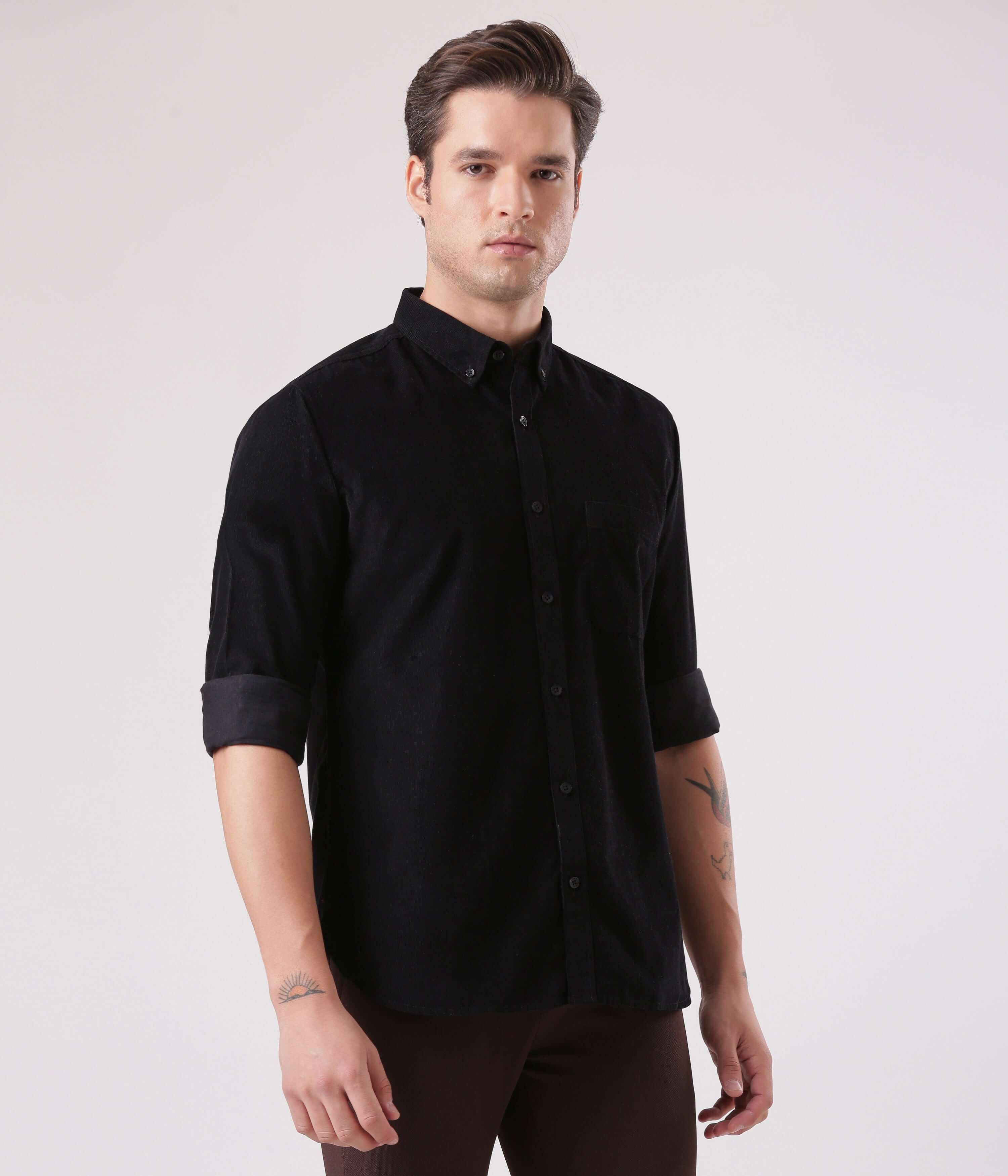 Model wearing Black Beauty corduroy shirt, stylish design showcasing Turms Intelligent Apparel for men.