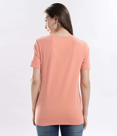 Back view of the Womens casual t-shirt Ember Orange cotton tshirt, showcasing its stretchable, waterproof, and anti-odour features.