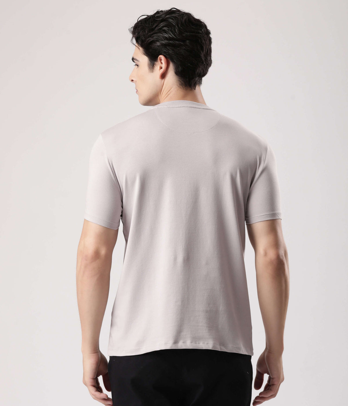 Back view of a man wearing the Panther Grey Turms Worry-Free Intelligent T-Shirt, showcasing style and comfort.