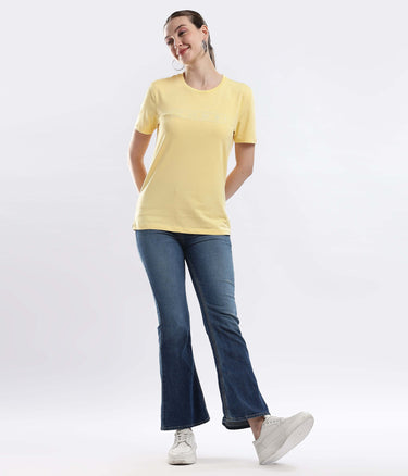 Womens casual t-shirt Aura Yellow t-shirt model wearing stretchable and breathable cotton fabric in casual outfit.